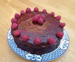 Chocolate cake with ganache and raspberries